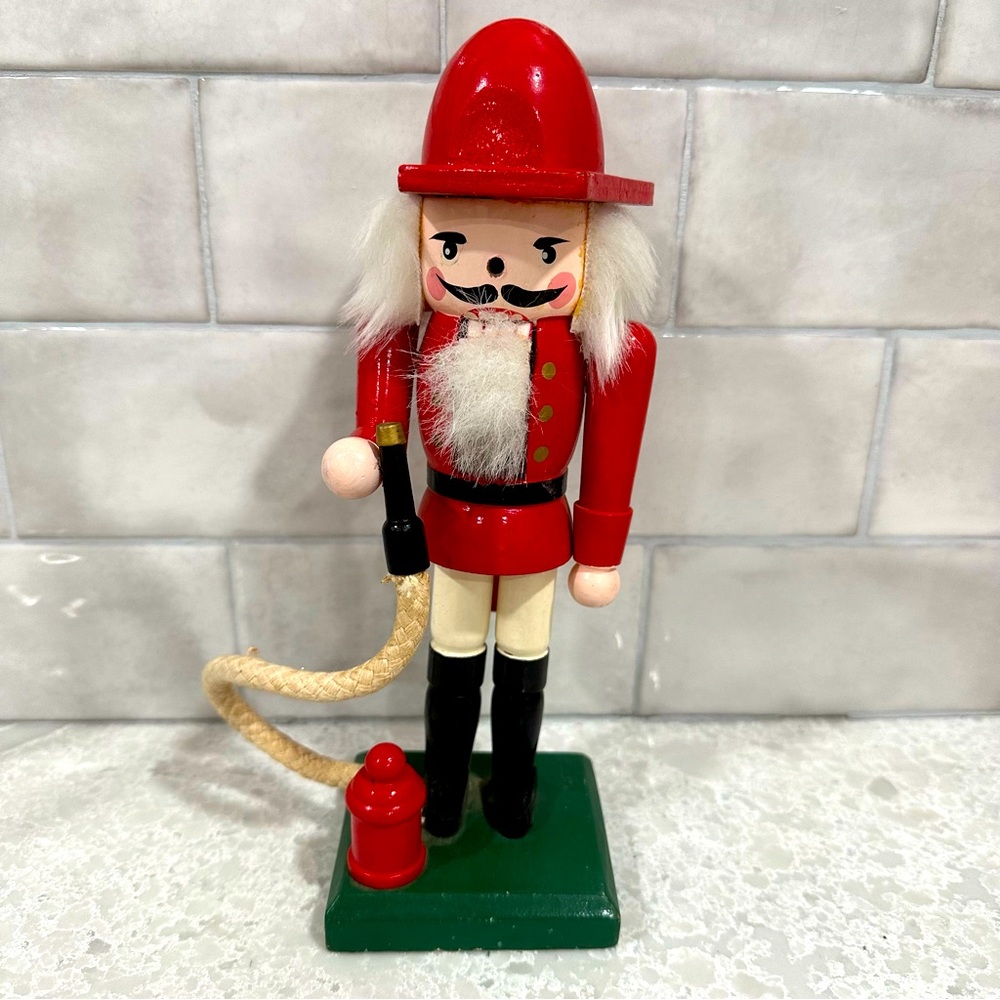 Kurt Adler 10" Fireman Nutcracker w/ Hose & Fire Hydrant.